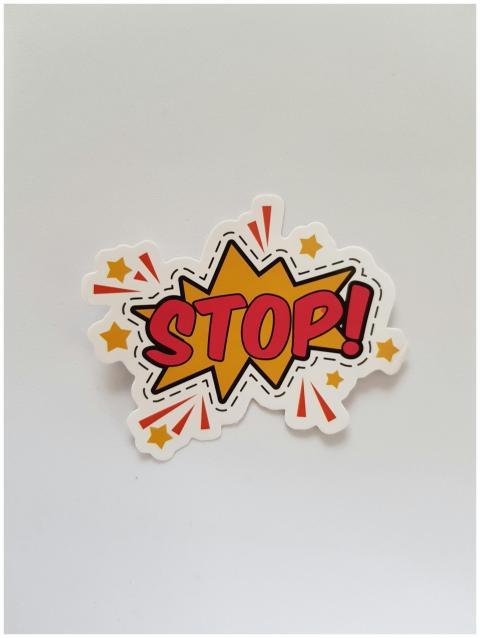 Bright and colorful sticker design featuring a com