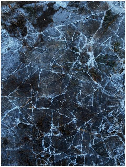 Close-up of a cracked marble texture with intricat