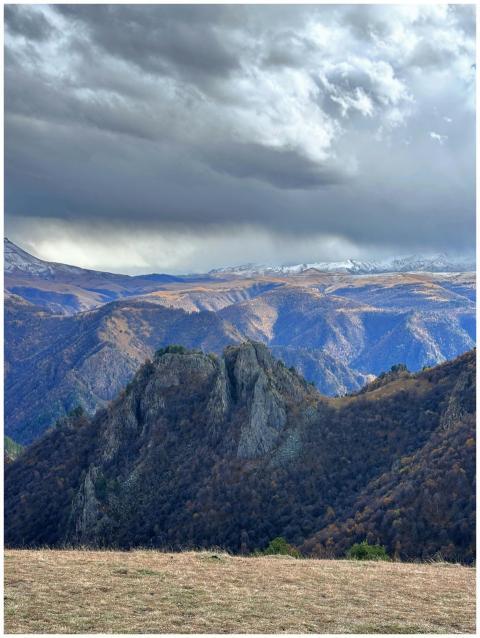 Epic view of rugged mountain range with dramatic c
