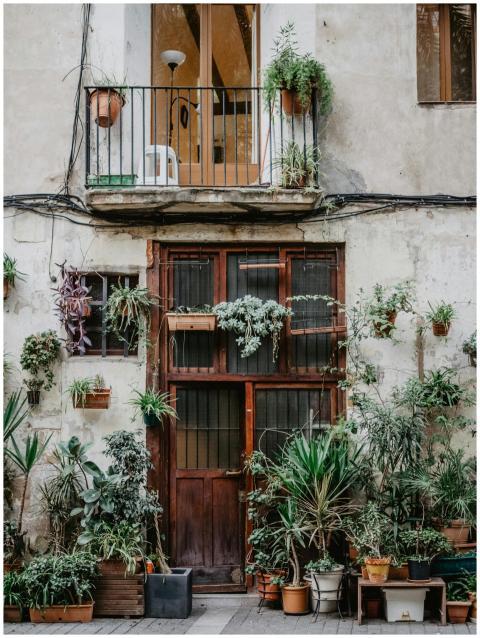Rustic facade in Barcelona featuring a charming ba