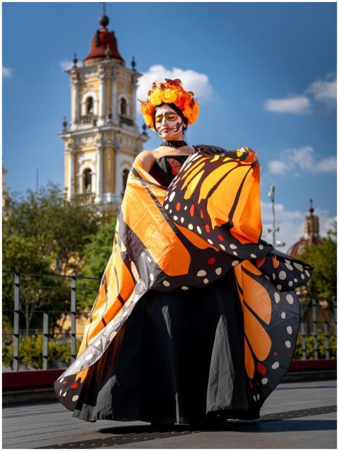 Woman in vibrant traditional Day of the Dead costu