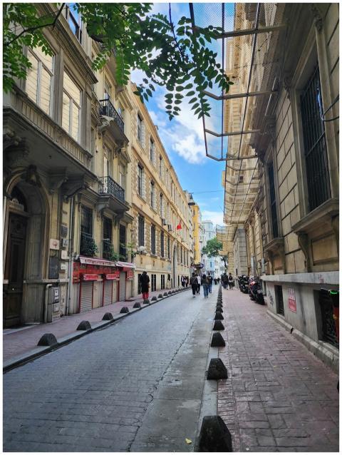 A vibrant scene of a busy street in Beyoğlu distri