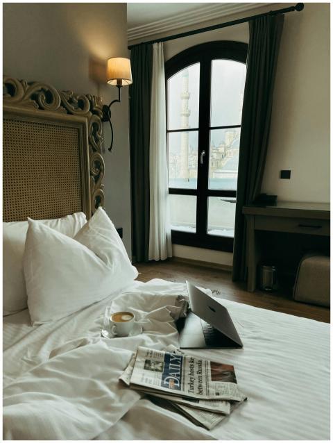 Luxurious hotel bedroom in Istanbul with a citysca