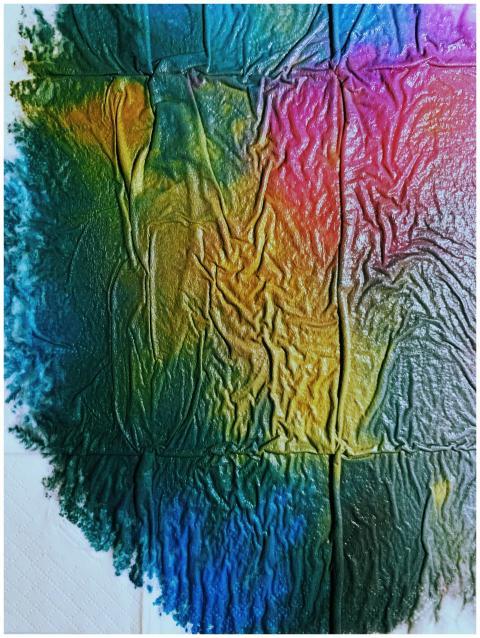 A colorful textured abstract painting with a mix o