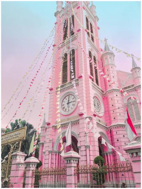 Low angle view of the vibrant pink Tan Dinh Church