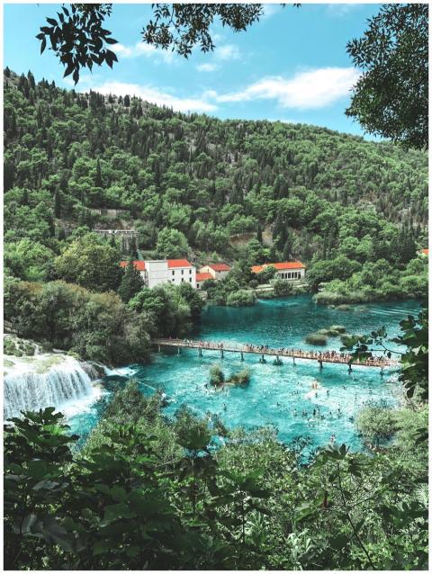 A breathtaking aerial view of waterfalls and lush