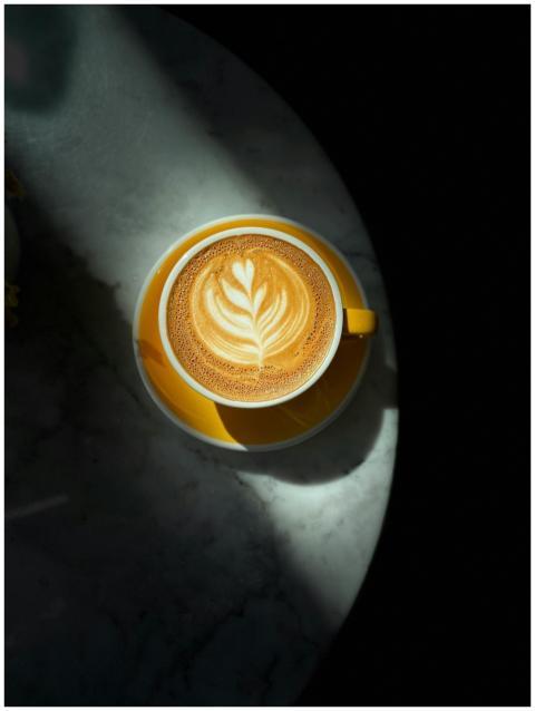 Top view of a beautifully crafted latte with art o