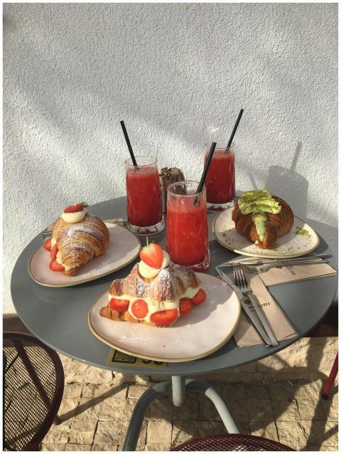 Delicious pastries and refreshing drinks on a sunn