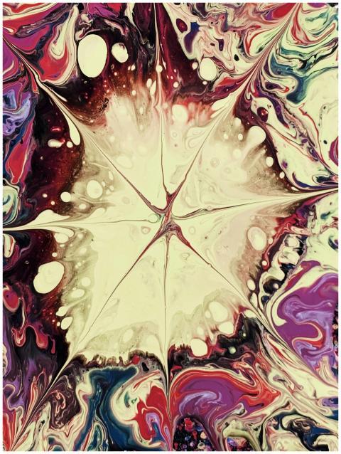Colorful abstract art featuring a striking star-sh