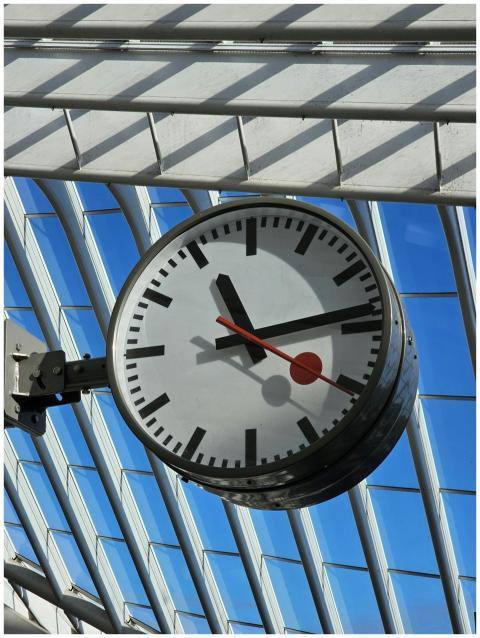 Close-up of a modern clock at Liège-Guillemins Sta