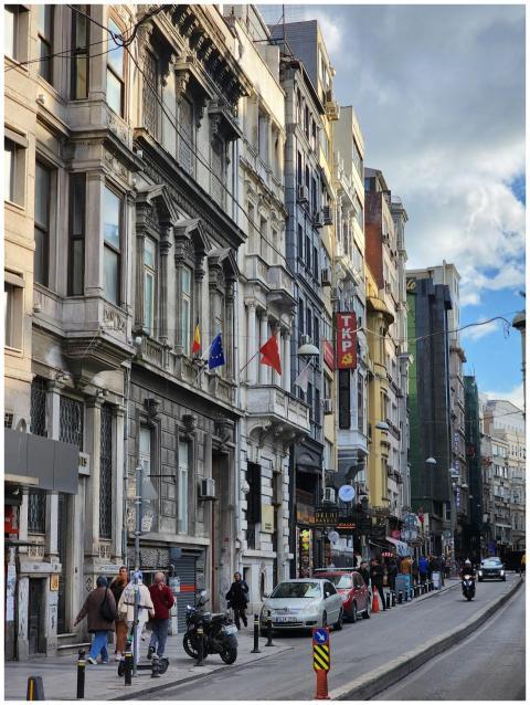 Lively street scene in Beyoglu, Istanbul with pede