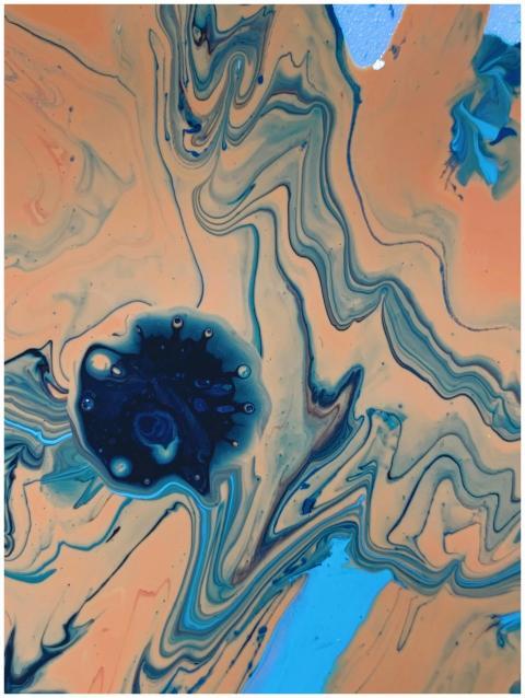 Dynamic abstract fluid painting featuring swirling