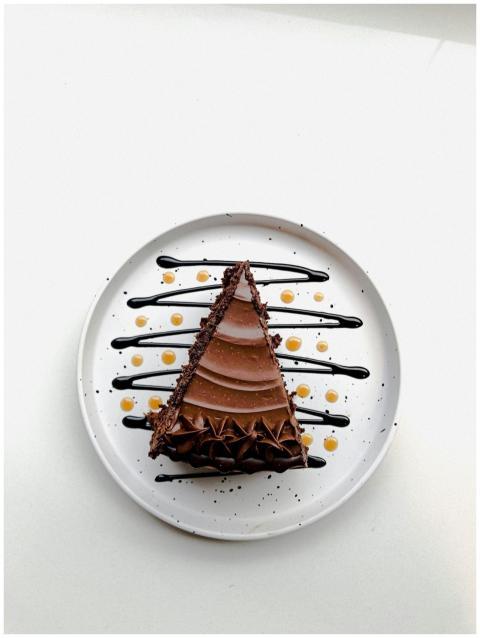 Indulge in a delicious slice of chocolate cake wit