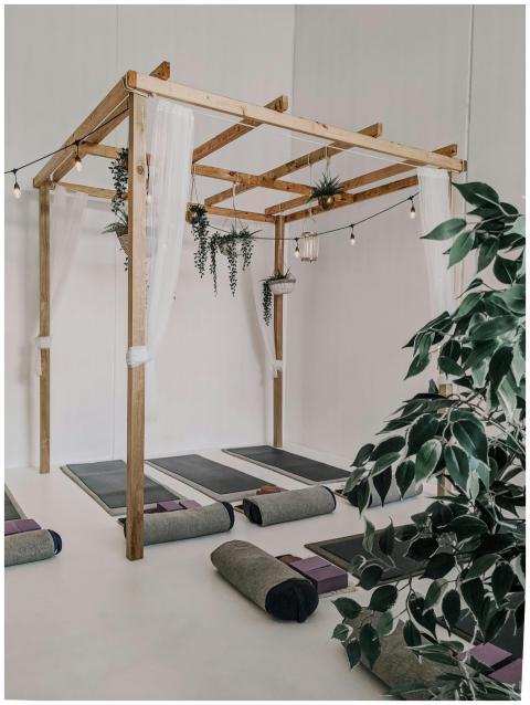 Peaceful yoga studio in Sydney with mats and woode