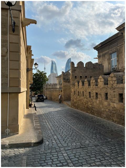 Cobblestone street in Baku, Azerbaijan with view o