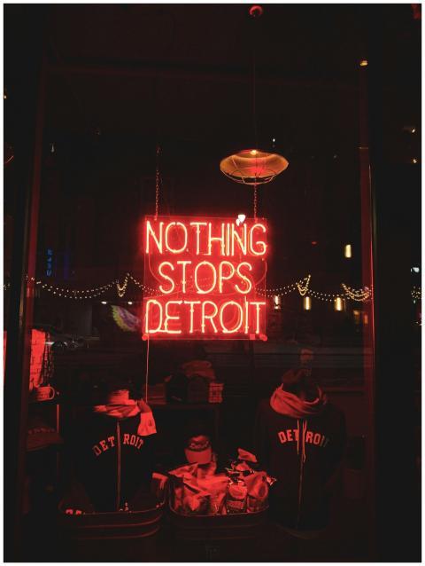 Vibrant neon sign reading 'Nothing Stops Detroit'