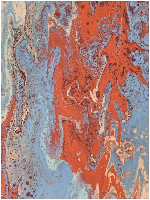 Dynamic fluid painting with swirling red and blue