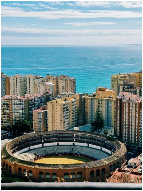 Stunning aerial view of Málaga's bullring with coa