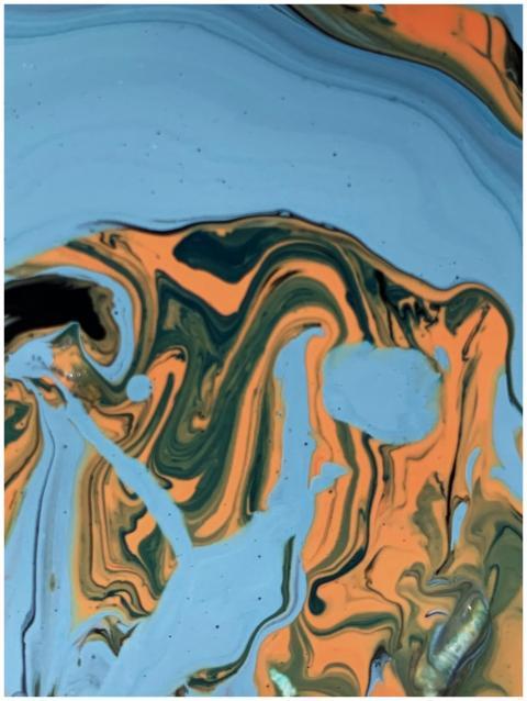 Dynamic abstract fluid art with swirling blue and