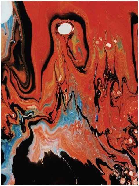 Dynamic abstract artwork featuring vivid red, blue