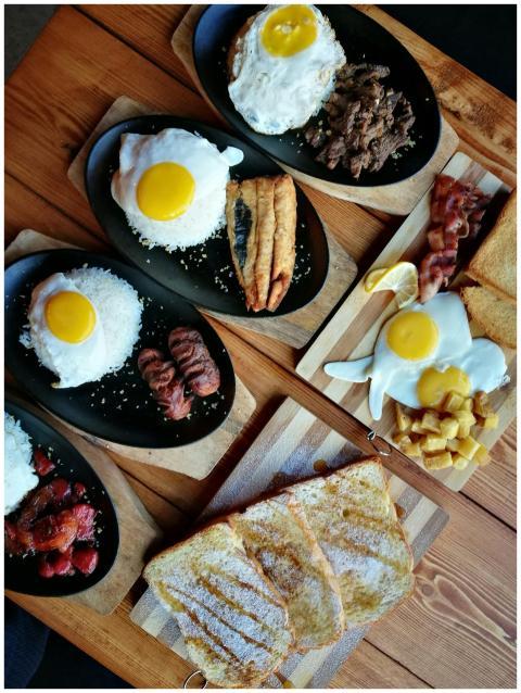 An appetizing breakfast spread featuring eggs, mea