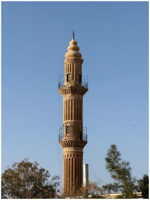 A detailed view of a historic mosque minaret in Ma