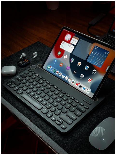 Close-up of a digital workspace featuring a tablet