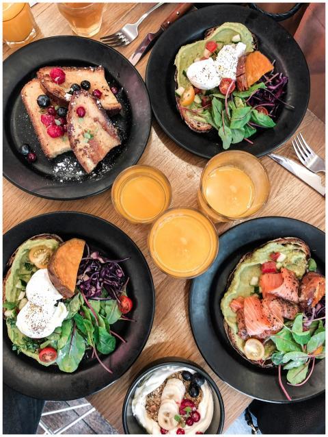 Top-down view of a vibrant brunch spread featuring
