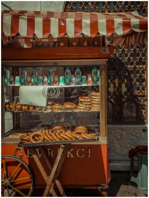 Assorted tasty baked bread and bottles of water pl
