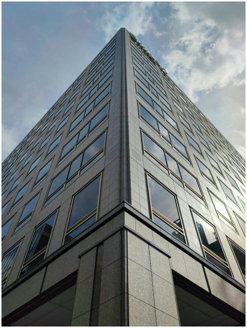 Striking perspective of a modern skyscraper in Tok