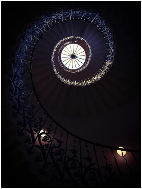 Captivating view of a spiral staircase with intric