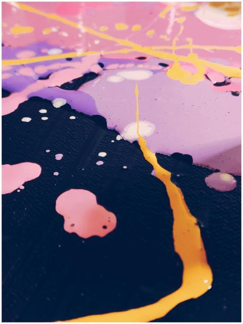 Dynamic abstract painting featuring vibrant splash