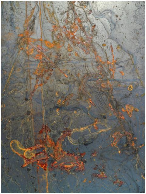 Dynamic abstract art featuring vibrant rust and bl