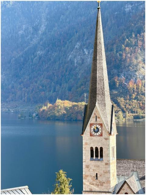 Scenic view of Hallstatt church tower with alpine