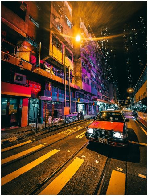 Retro taxi car waiting in front of pedestrian zebr