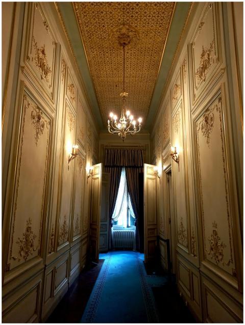 A beautifully decorated Neo-Baroque hallway with o