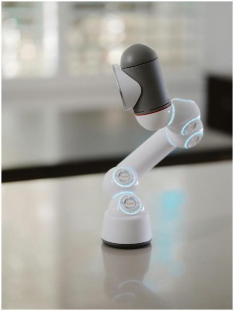 A modern robot with illuminated joints displayed i