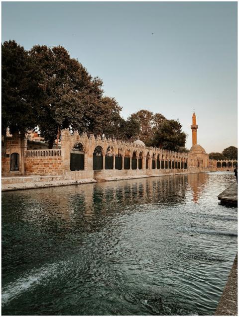 Calm waters and historic architecture at Balıklıgö