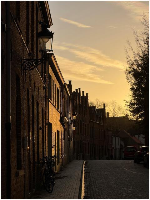 Sunset view of a traditional street in Brugge, Bel