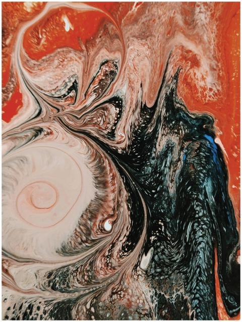 Colorful abstract fluid art with swirling acrylic