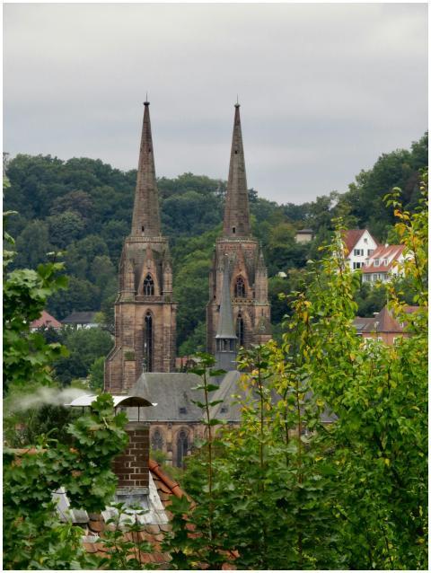 Twin church spires overlook Marburg's scenic lands