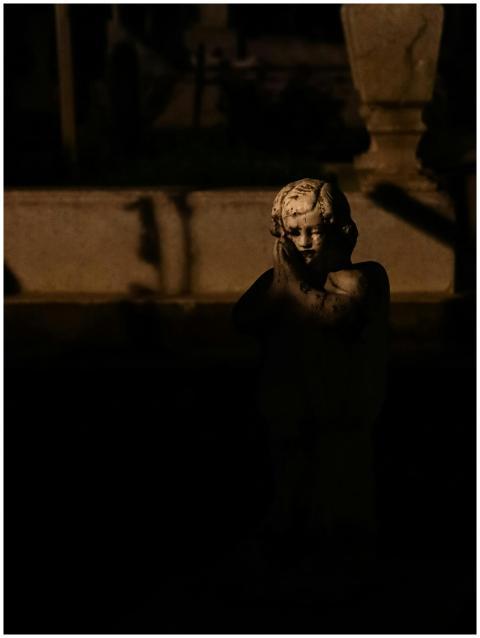 Mysterious Nighttime Statue Dim