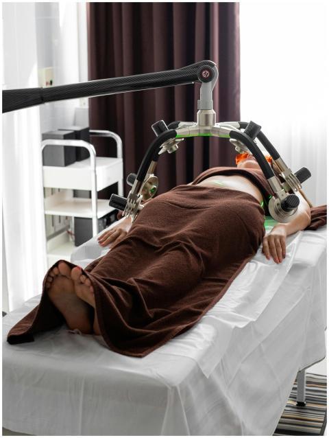 Female patient undergoing a contemporary laser tre
