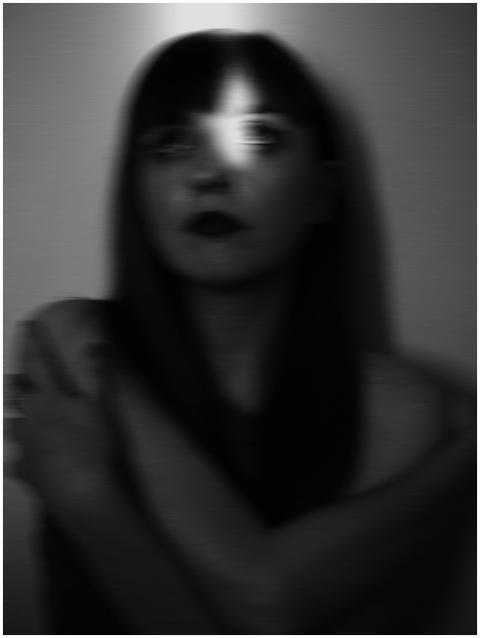 Artistic black and white portrait of a woman with