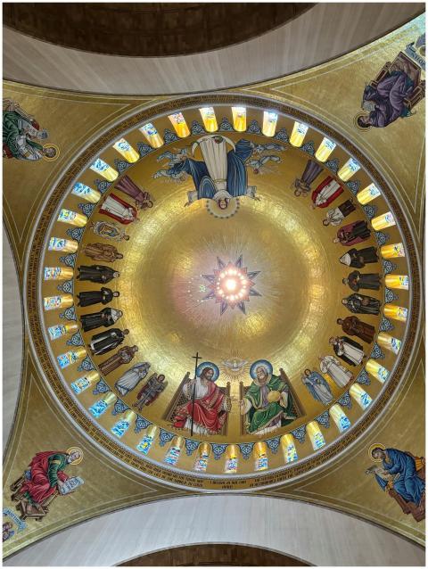 Intricate dome ceiling with religious paintings in