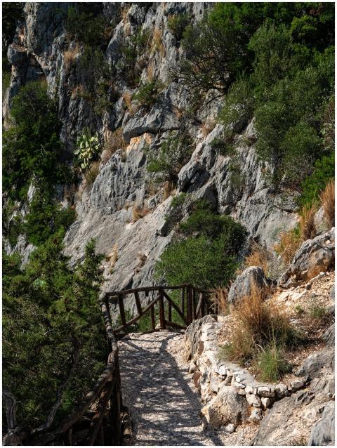 Explore the rugged hiking trail along the cliffs o