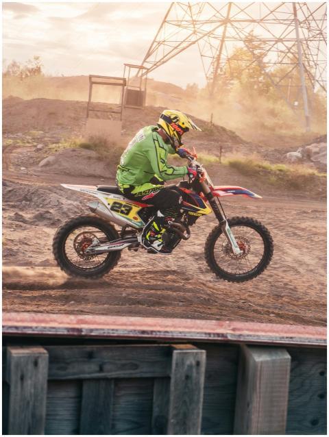 Exciting action shot of a motocross rider speeding