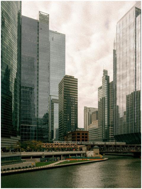 Stunning view of skyscrapers along a city river sh