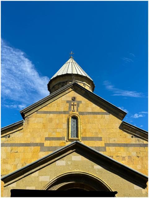 A historic church with a distinct architectural do