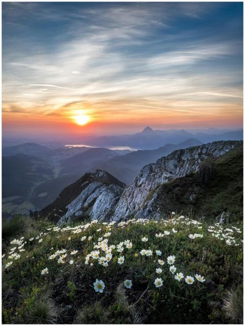 A stunning sunrise view over a rocky mountain land